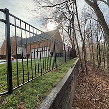 Full-Landscape-Renovation-Retaining-Wall-Replacement-Black-Aluminum-Fence-Installation-in-Winston-Salem-NC 2